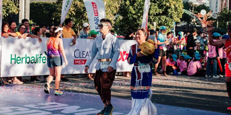 a couple of people that are standing in the street