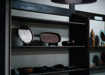 a shelf filled with lots of different types of items