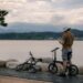 Man on bike enjoys serene view of Gyeongpo Lake, South Korea.