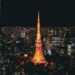 Stunning nighttime view of the Tokyo Tower glowing in the vibrant Tokyo skyline, Japan.