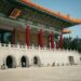 The stunning Taipei National Theater with traditional Chinese architecture under a clear sky.